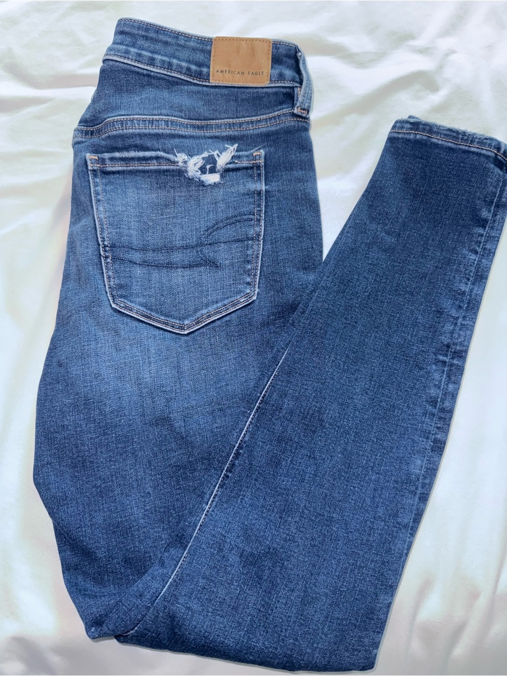 American Eagle Outfitters Dark Blue Skinny Jeans with Back Pocket Distress